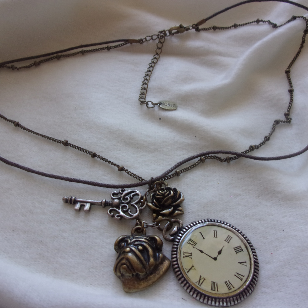 Icing necklace charms of time and dog and flowers